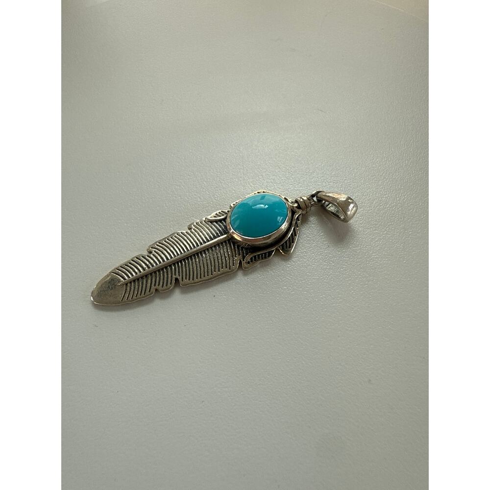 925 silver feather sleeping beauty turquoise pendant - stamped “D’Joy 925”